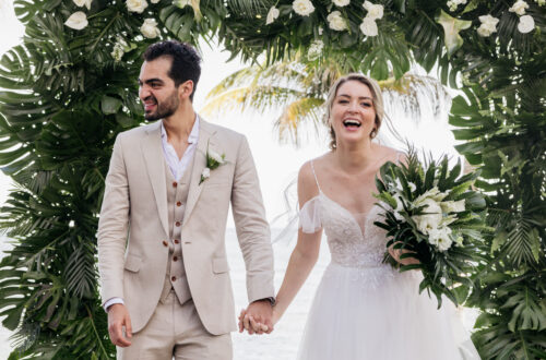 Meghan & Rodrigo walking down aisle